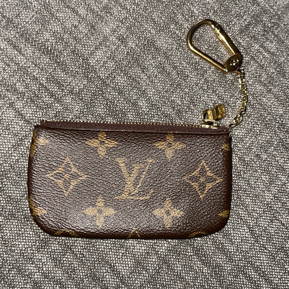 Used Louis Vuitton key card holder color brown and gold